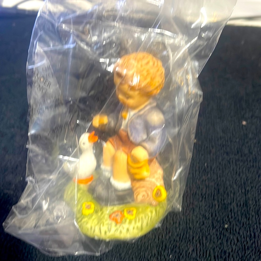 Berta Hummel figurine snack time. Everybody like a little snack time don’t we?